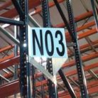 Teepee-style warehouse aisle marker sign