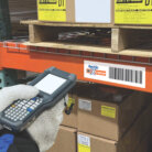 warehouse freezer barcode label being scanned