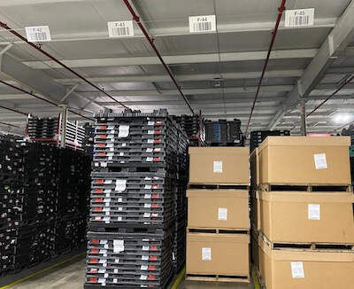 Warehouse barcode signs above inventory